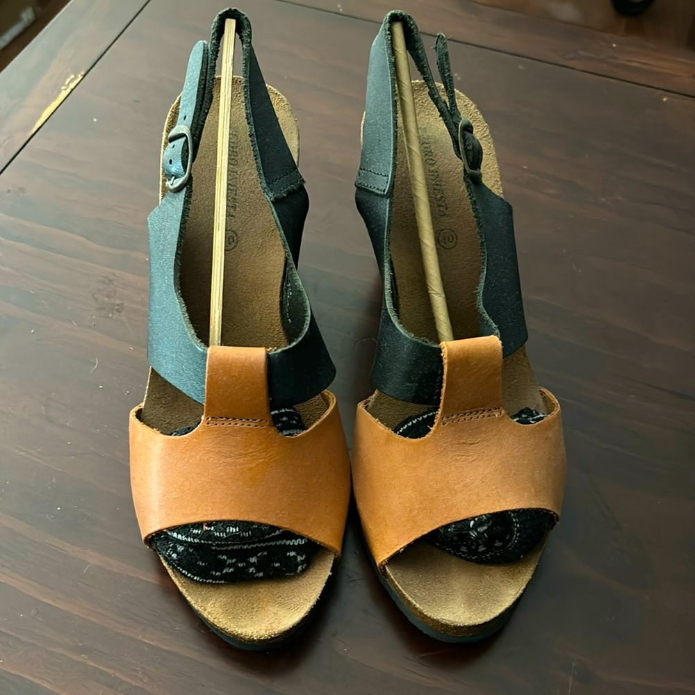 Women’s Wedge Leather Sandal Size 10 US (feels like 9 US).